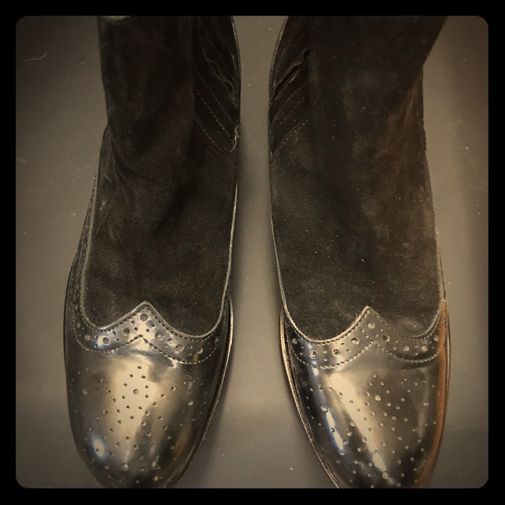 Black boots by Barbara Barbieri